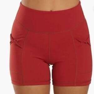 Free People Movement Wave Rider Shorts in the color Brick Merlot Red Medium